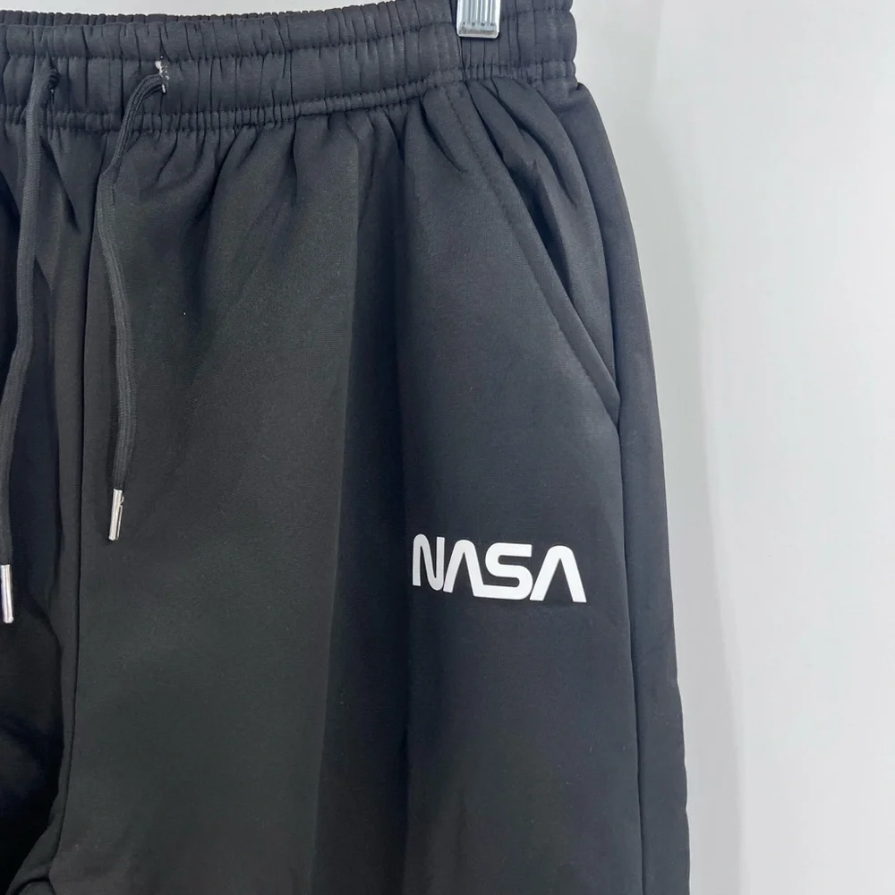 SHEIN MEN’s NASA joggers are fleece-lined. Medium